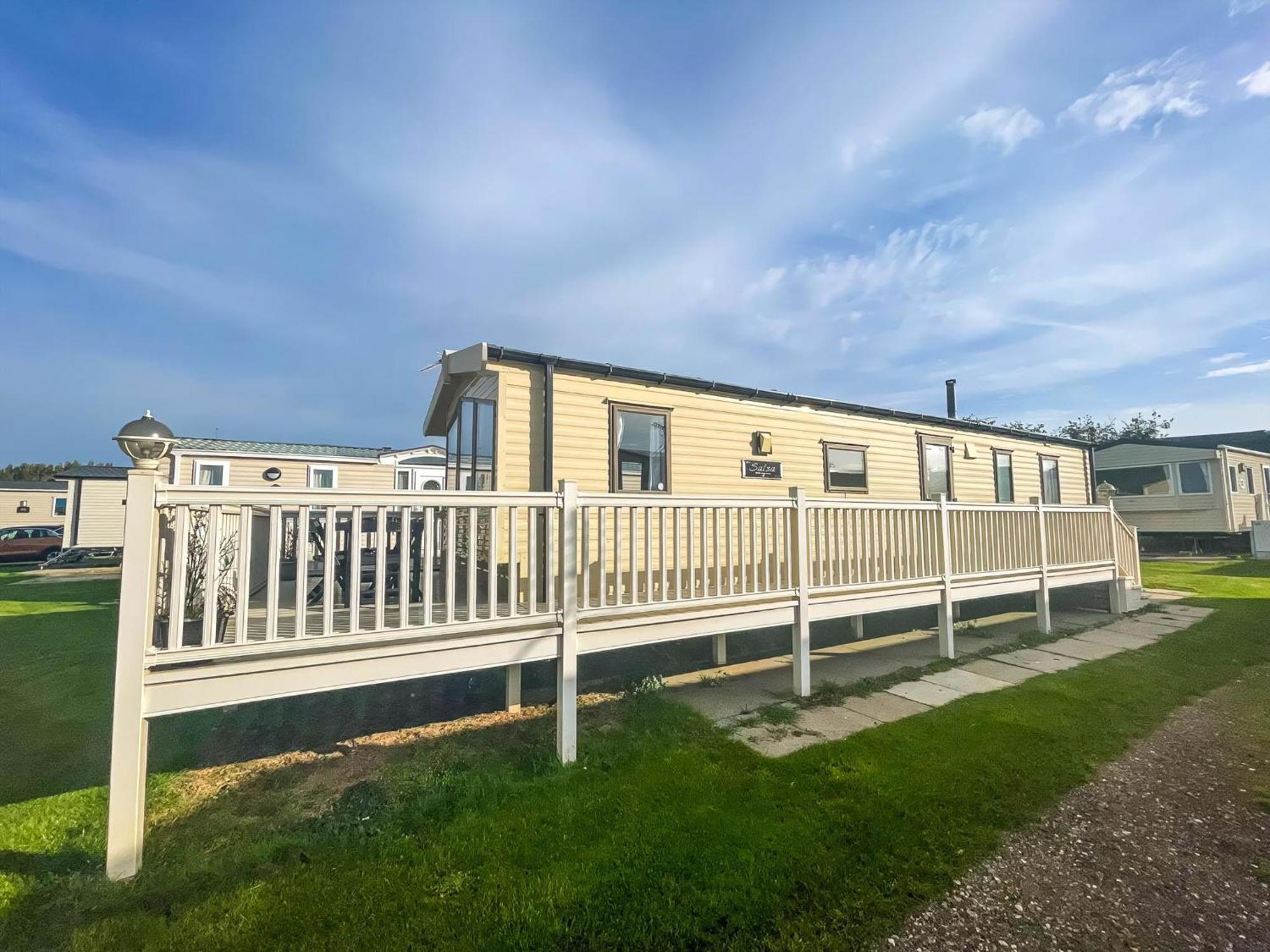 Caravan With Decking Within Walking Distance To Ref 23054s Campsite *