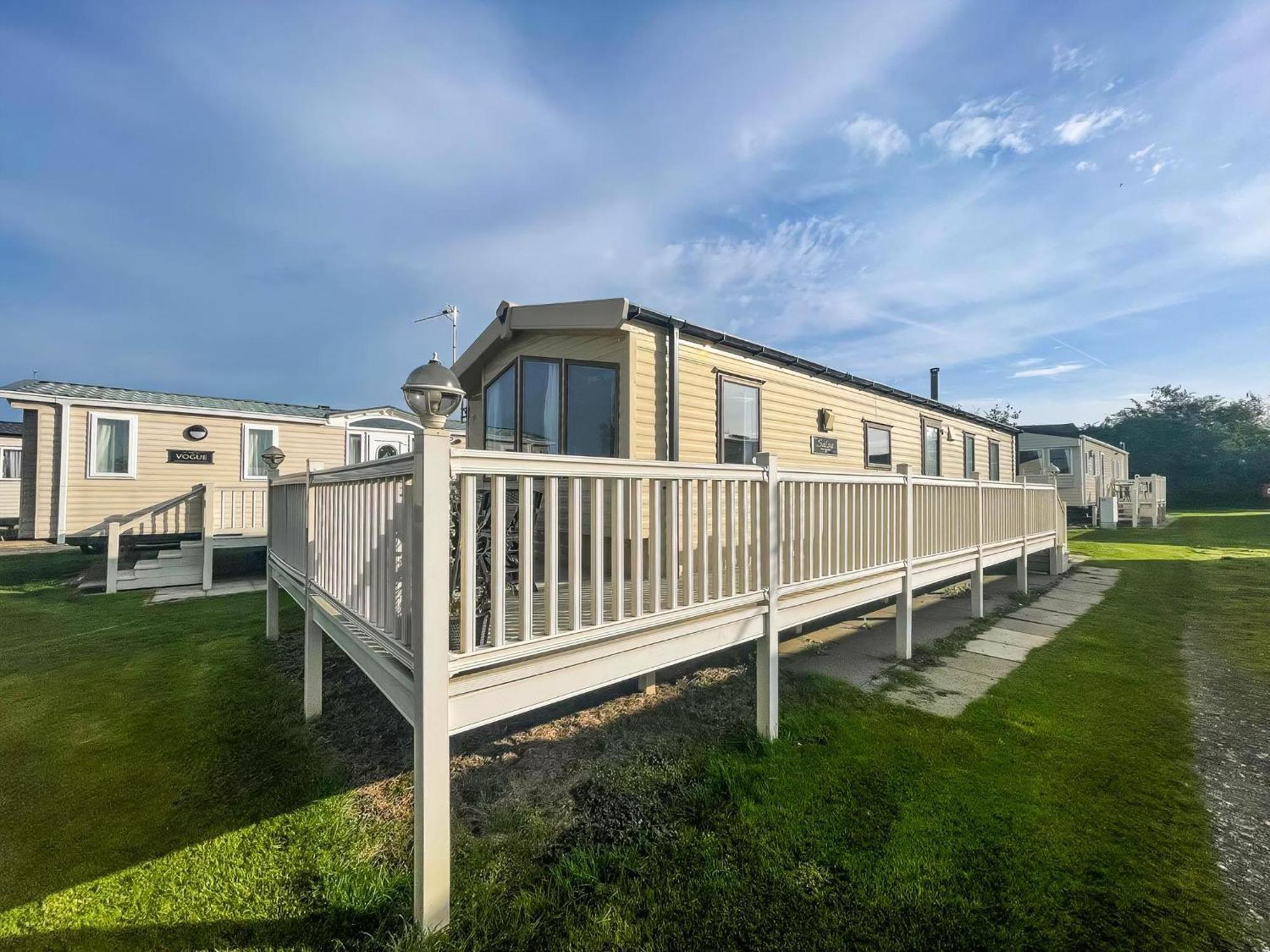 Caravan With Decking Within Walking Distance To Ref 23054s Campsite *